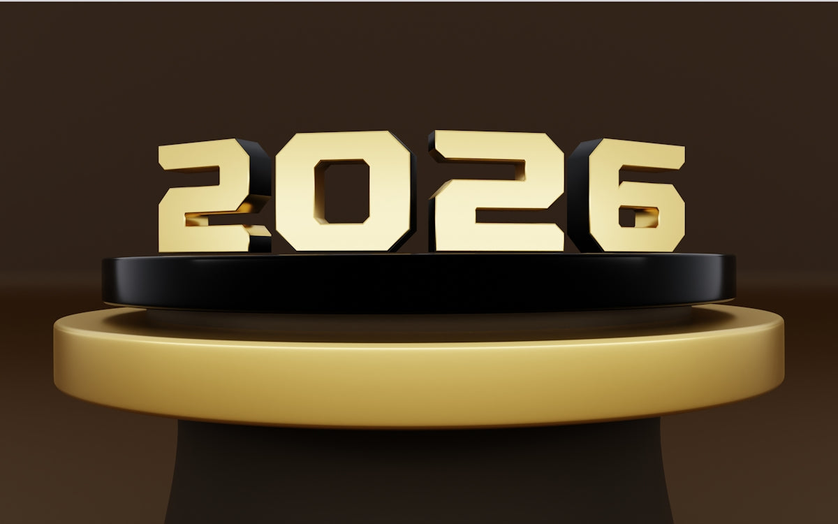 The year 2026 displayed in gold on a podium.