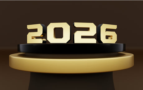 The year 2026 displayed in gold on a podium.